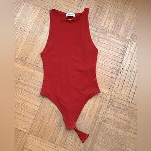 Babaton fiery orange body suit